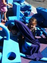 girl playing in imagination playground