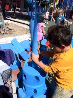 boy playing in imagination playground