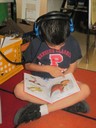 Student listens to stories on CD