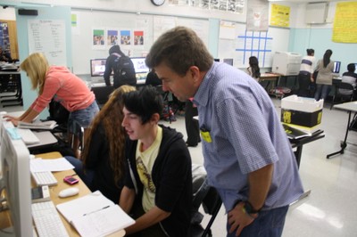 Reporter volunteering at school